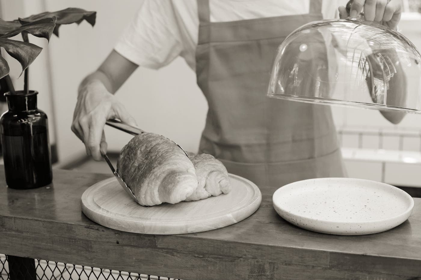 A wooden serving board with a fitted lid on a kitchen counter