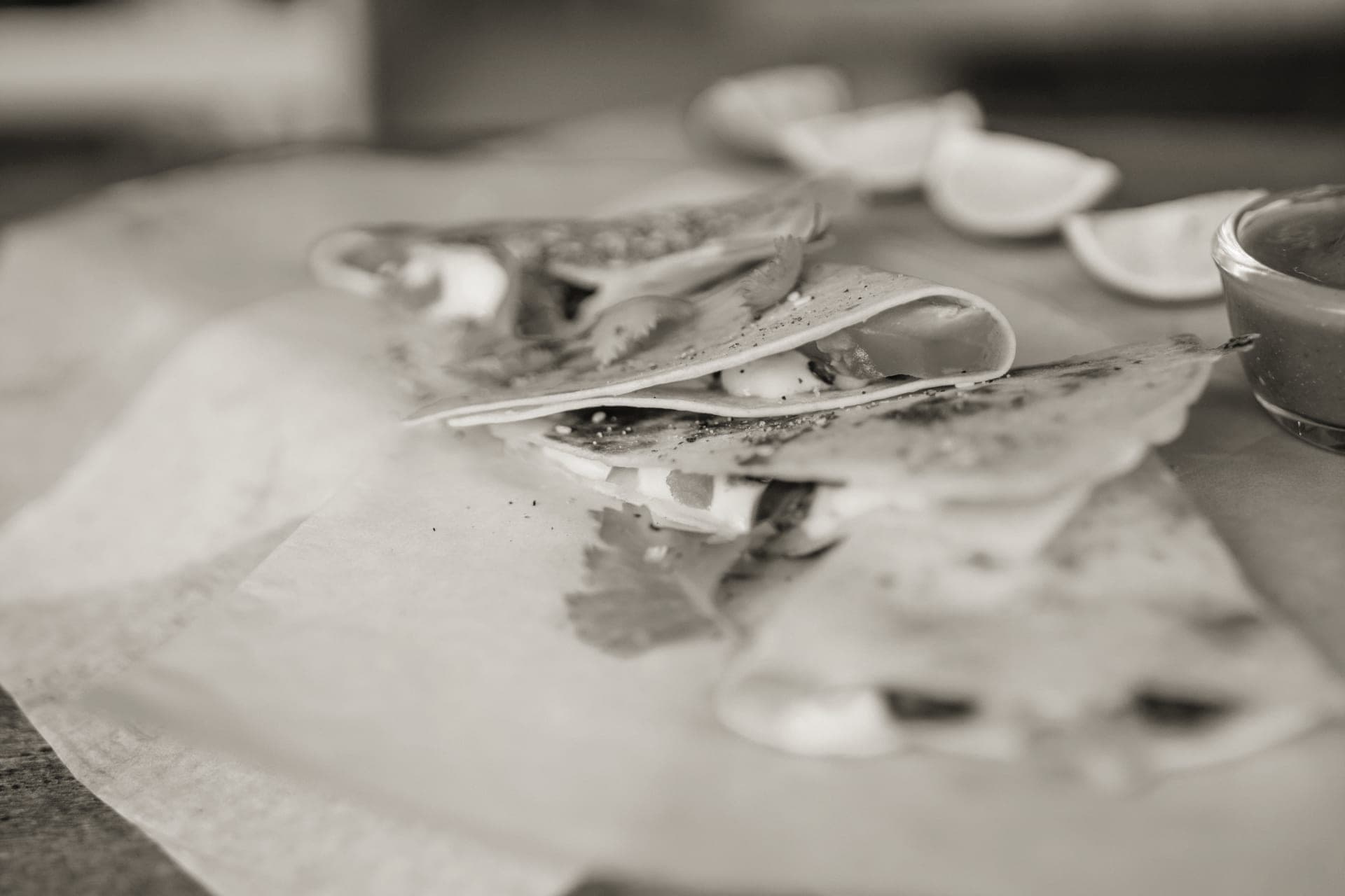 Wedges of cheese wrapped in paper for storing