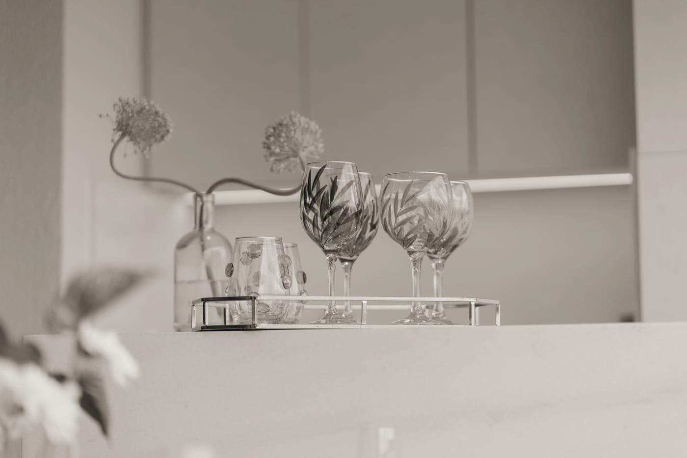 Wine glasses on an everyday kitchen counter