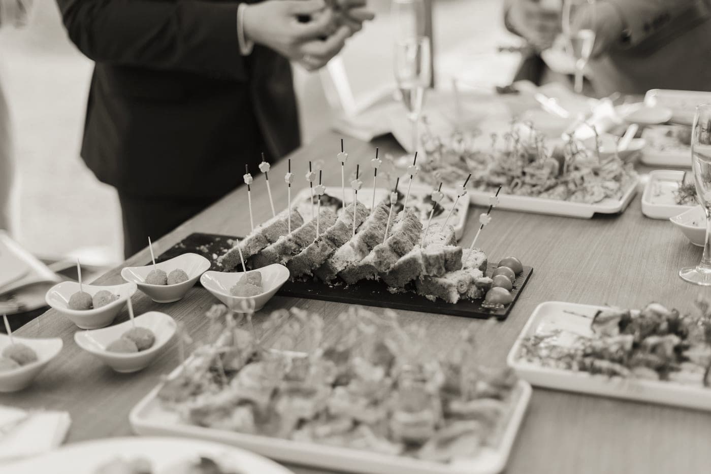 A party buffet table of food laid out for many guests