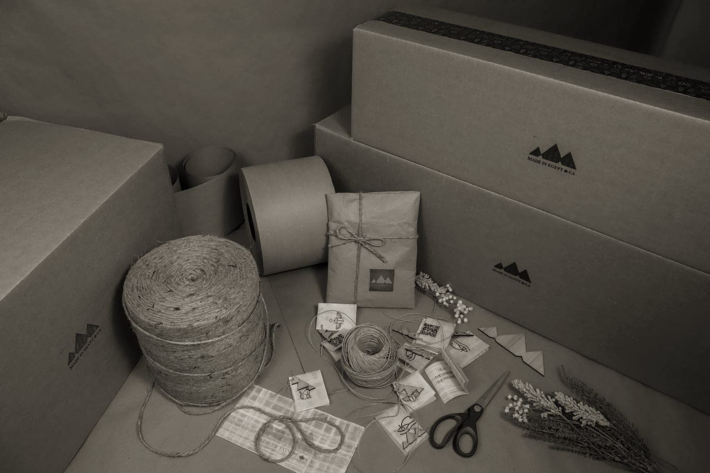 Small gift boxes wrapped in kraft paper and twine