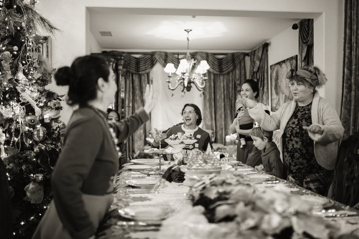 A festive holiday dinner table set for a group