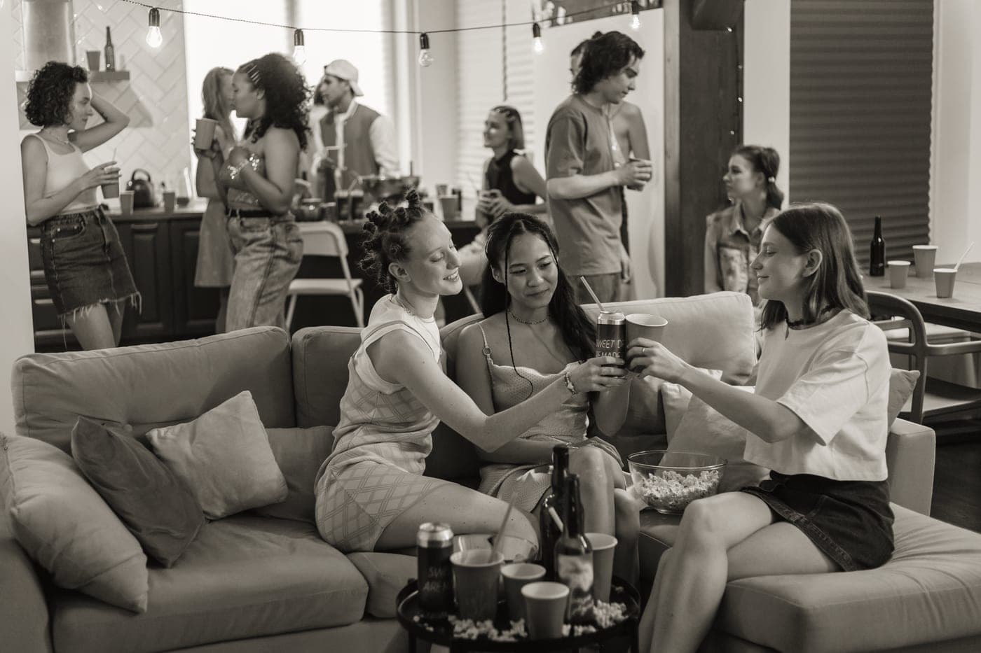 A host serving guests at a home party