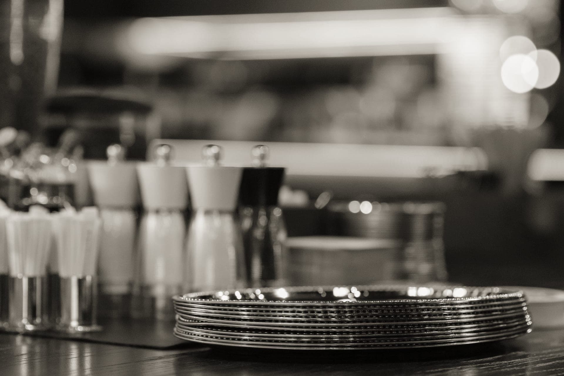 A stack of melamine plates on an outdoor table