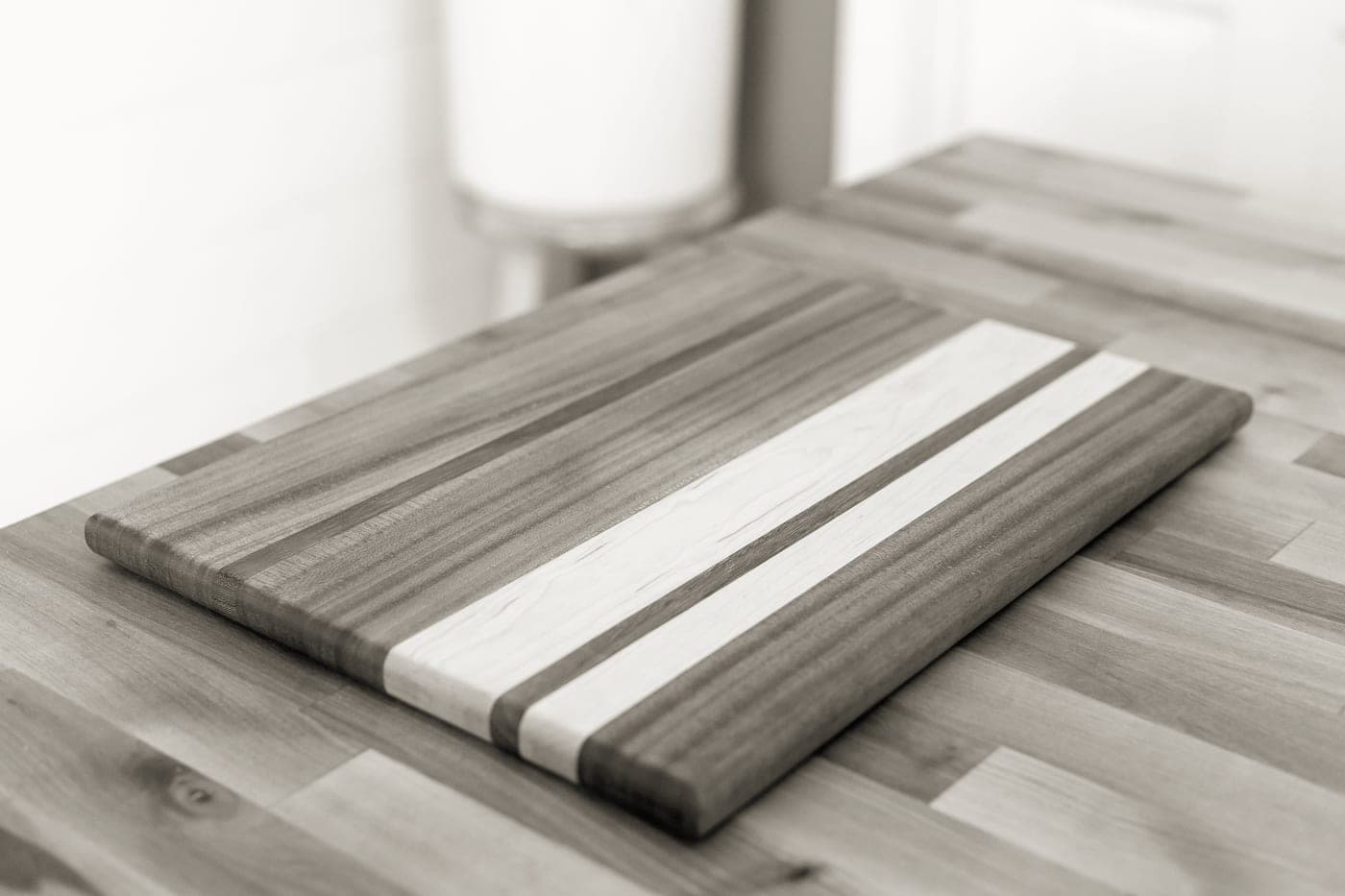 Acacia wood cutting board showing grain texture